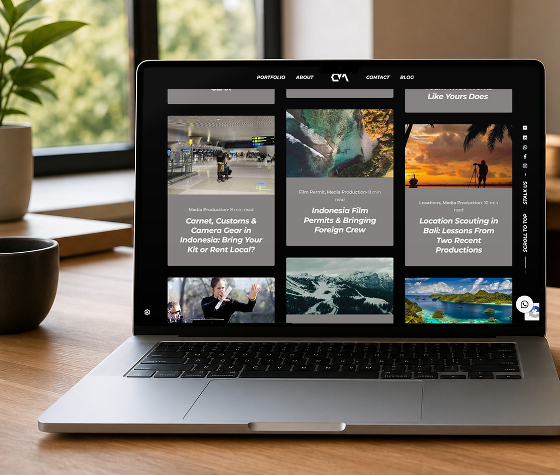 Overcrank Media blog redesign mockups on laptop and iPad